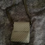 Black unisex messenger bag